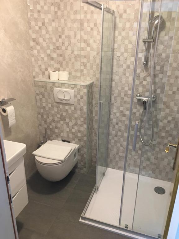 Kúpeľňa v ubytovaní Apartmani Dušanka
