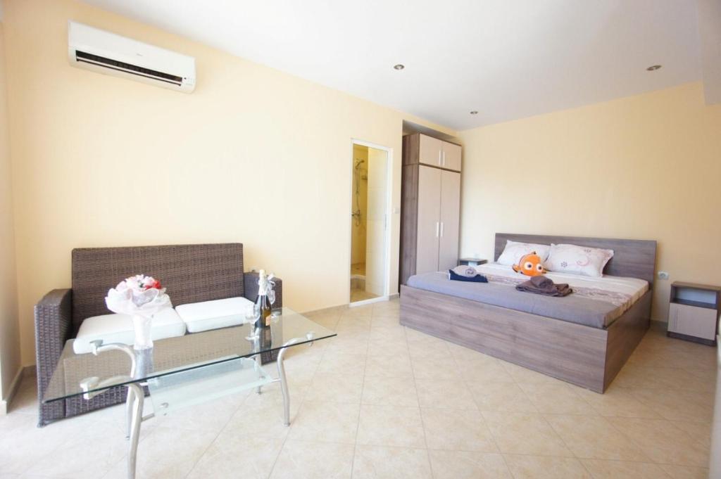 Ένα ή περισσότερα κρεβάτια σε δωμάτιο στο Kabakum Holiday Studio