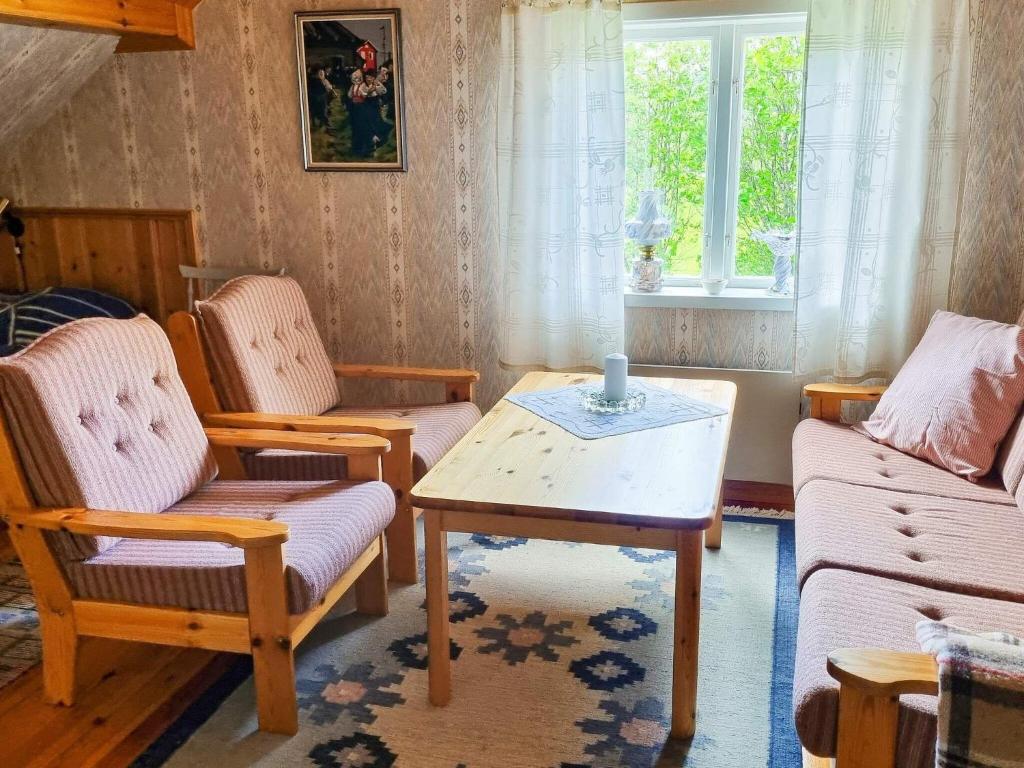 Posezení v ubytování 4 person holiday home in JÄRVSÖ-By Traum