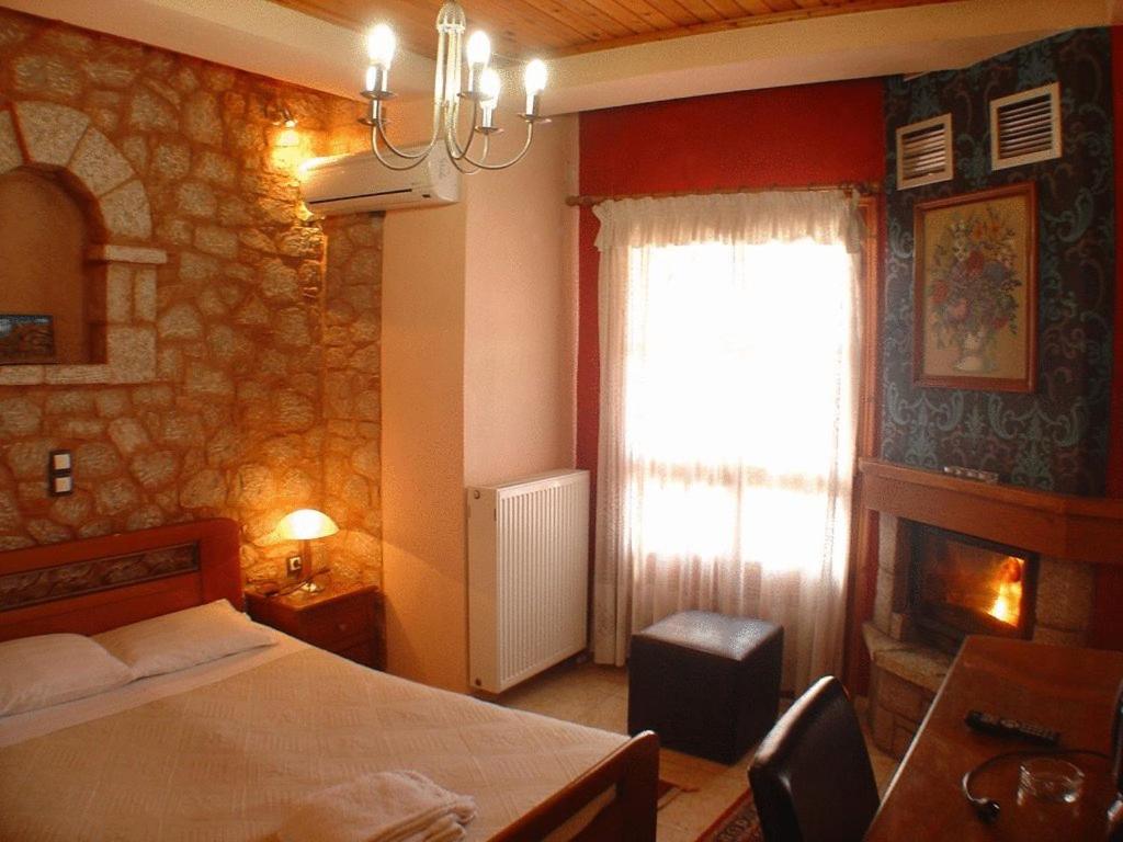 Postel nebo postele na pokoji v ubytování Ariadne Guesthouse