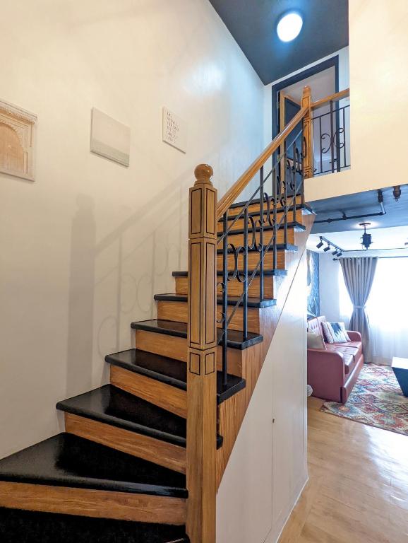 Fotografie z fotogalerie ubytování Budget 1BR Loft Apartment in Cainta Cambridge Village v destinaci Cainta