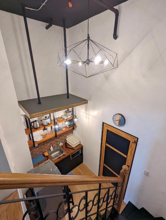 Fotografie z fotogalerie ubytování Budget 1BR Loft Apartment in Cainta Cambridge Village v destinaci Cainta
