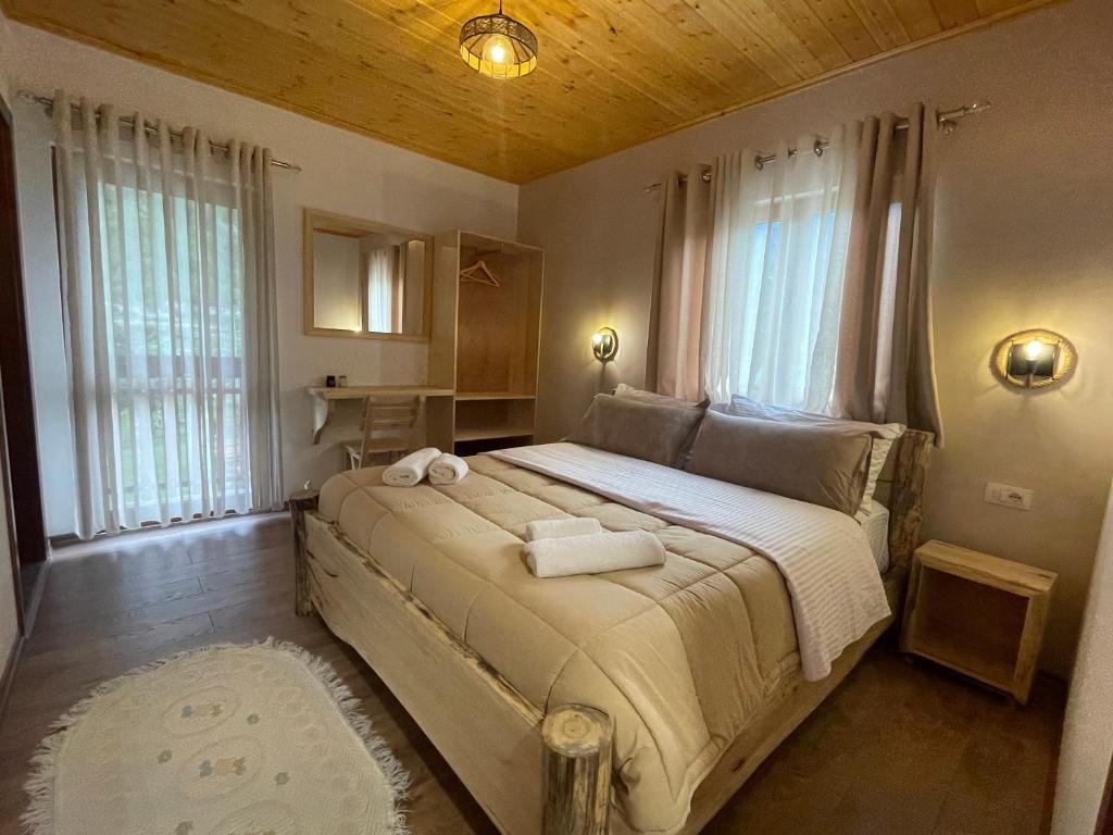 Кровать или кровати в номере 'Gurra Family' Guesthouse