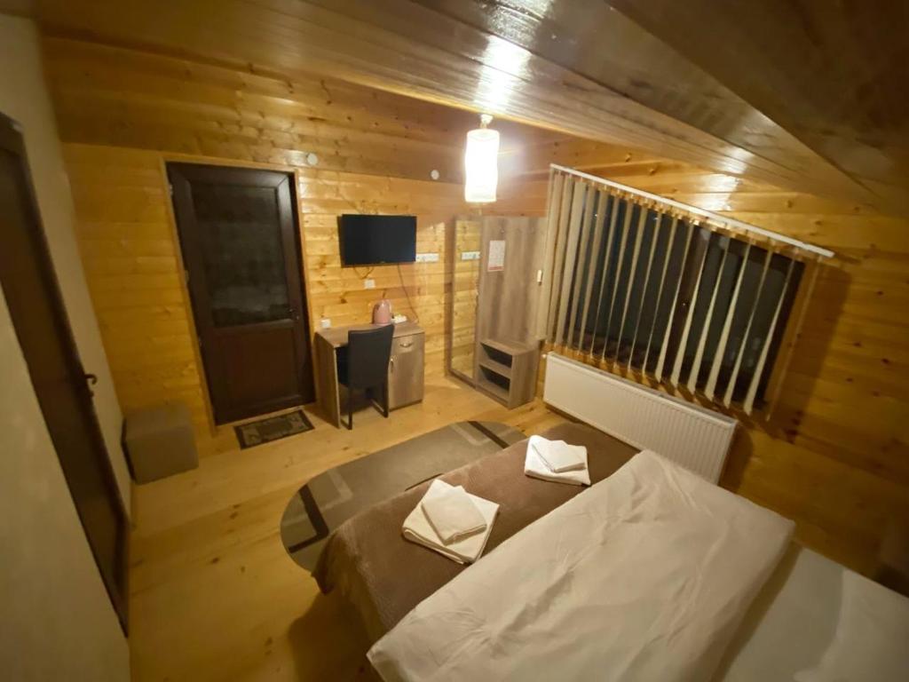 Postel nebo postele na pokoji v ubytování Four Season In Kazbegi