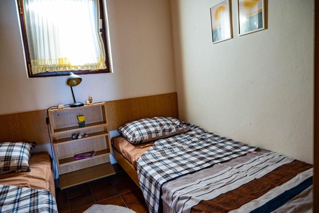 Postel nebo postele na pokoji v ubytování Hidden Gem of Krasici