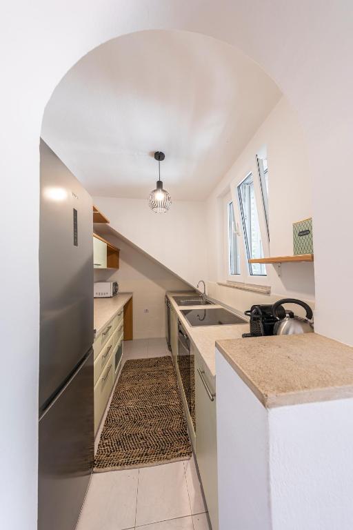 Kuchyňa alebo kuchynka v ubytovaní Sunlight apartment
