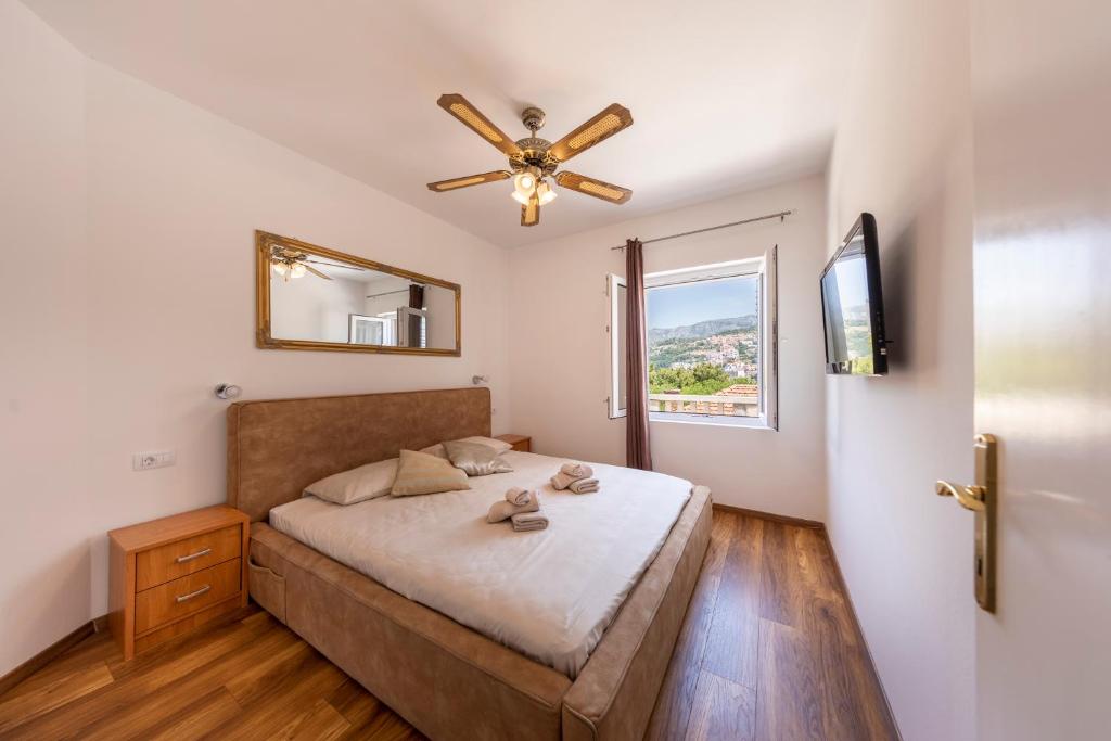 Posteľ alebo postele v izbe v ubytovaní Sunlight apartment