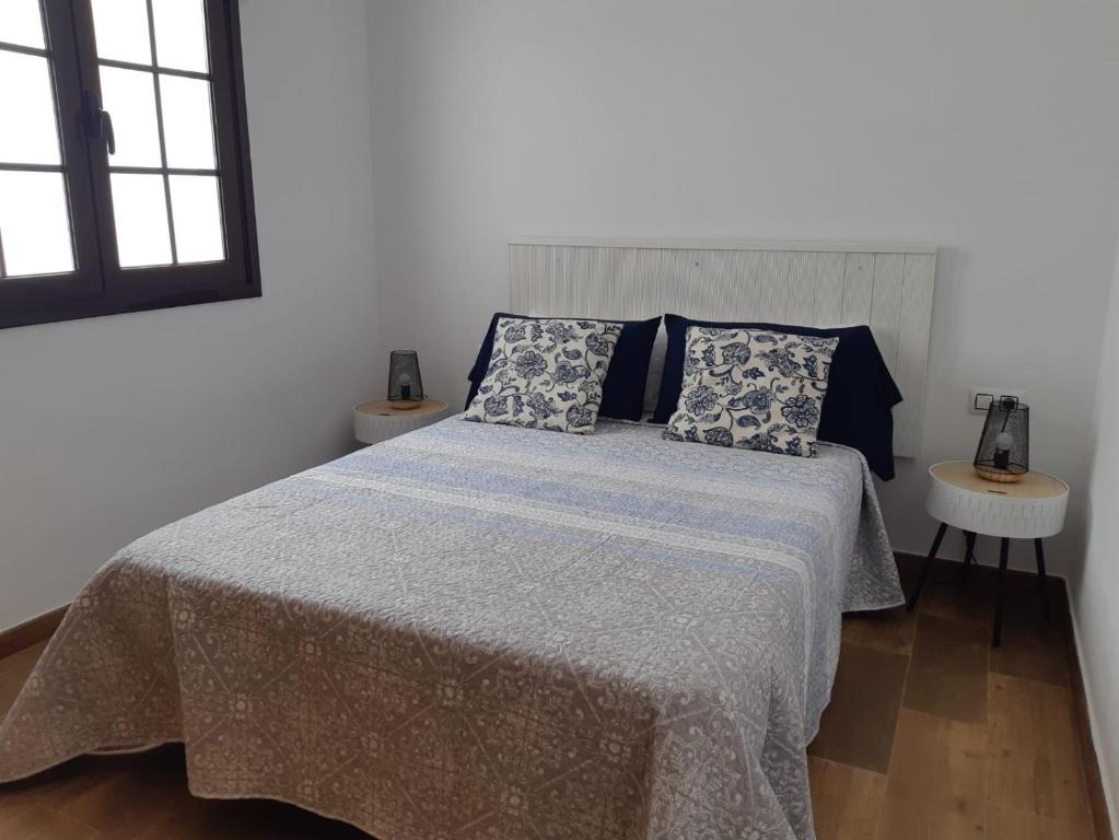 Postel nebo postele na pokoji v ubytování Apartamentos Cotillo Family