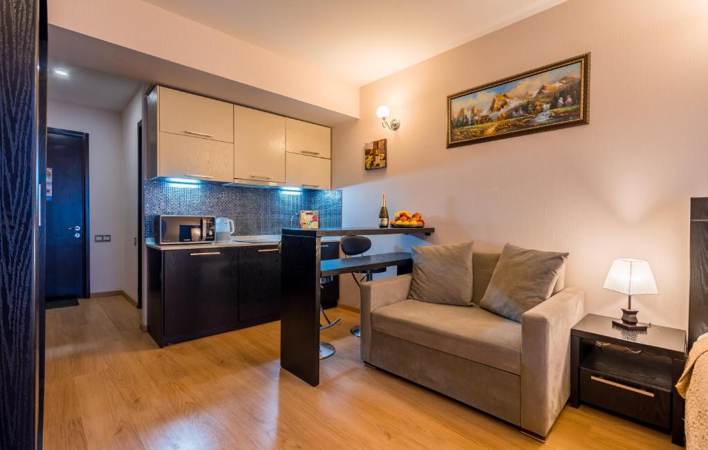 Kuchyň nebo kuchyňský kout v ubytování Studio Apartment NFT New Gudauri 215
