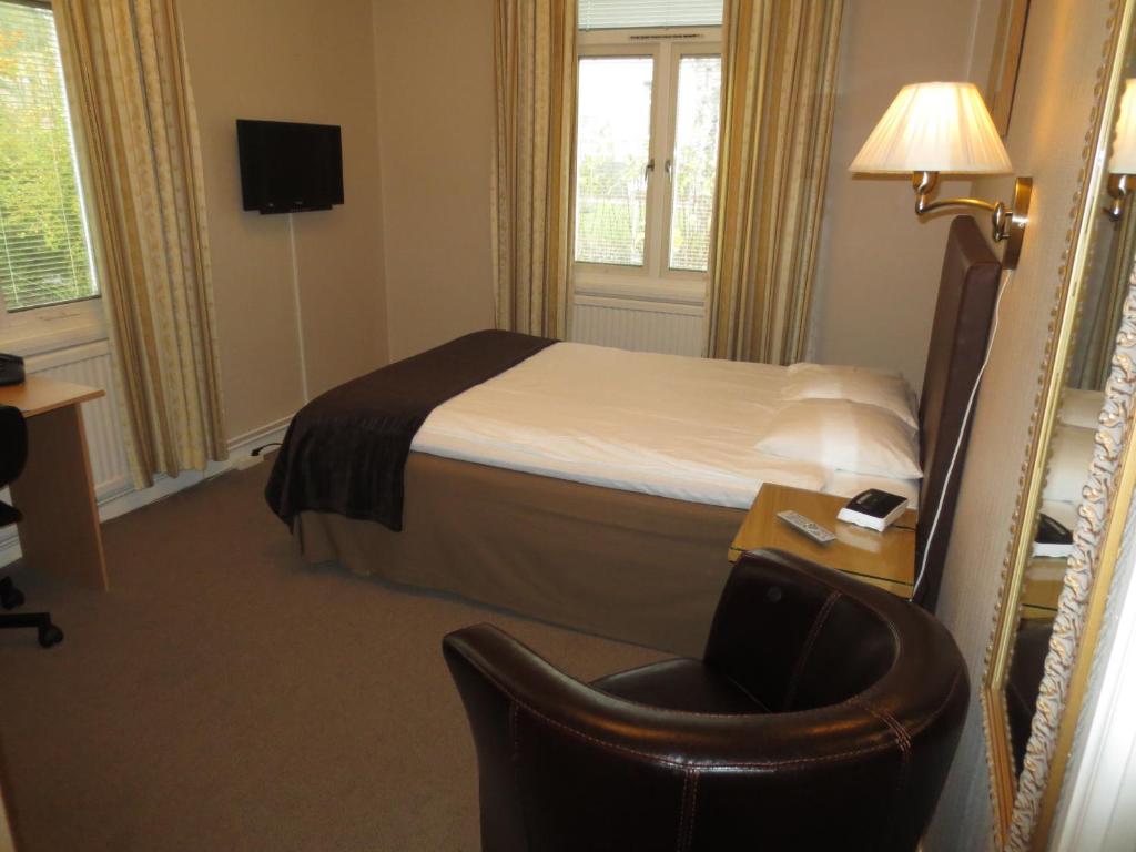 Postel nebo postele na pokoji v ubytování Hotell S:t Olof