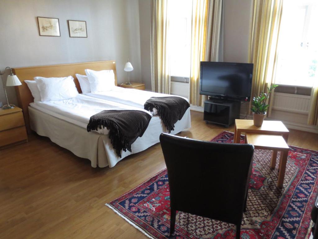 TV a/nebo společenská místnost v ubytování Hotell S:t Olof