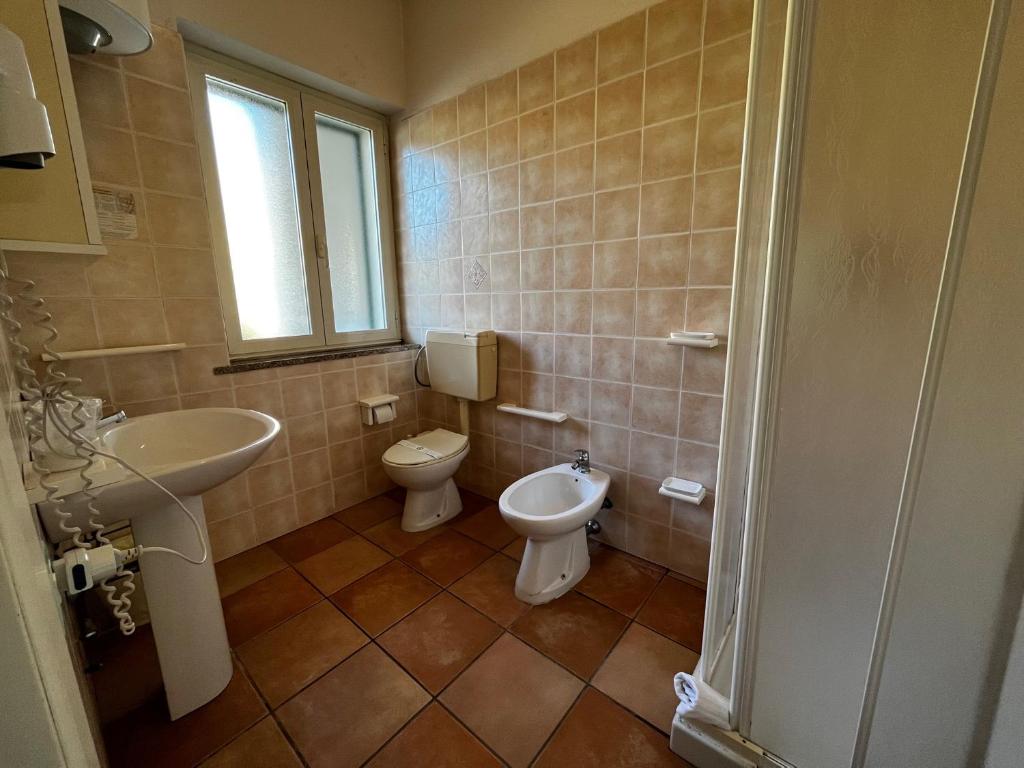 Koupelna v ubytování Hotel Frassetto