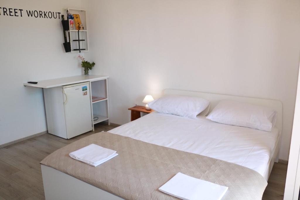 Postel nebo postele na pokoji v ubytování Olive apartments 3