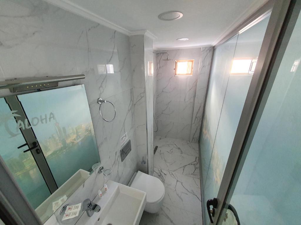 Koupelna v ubytování Hotel Aloha