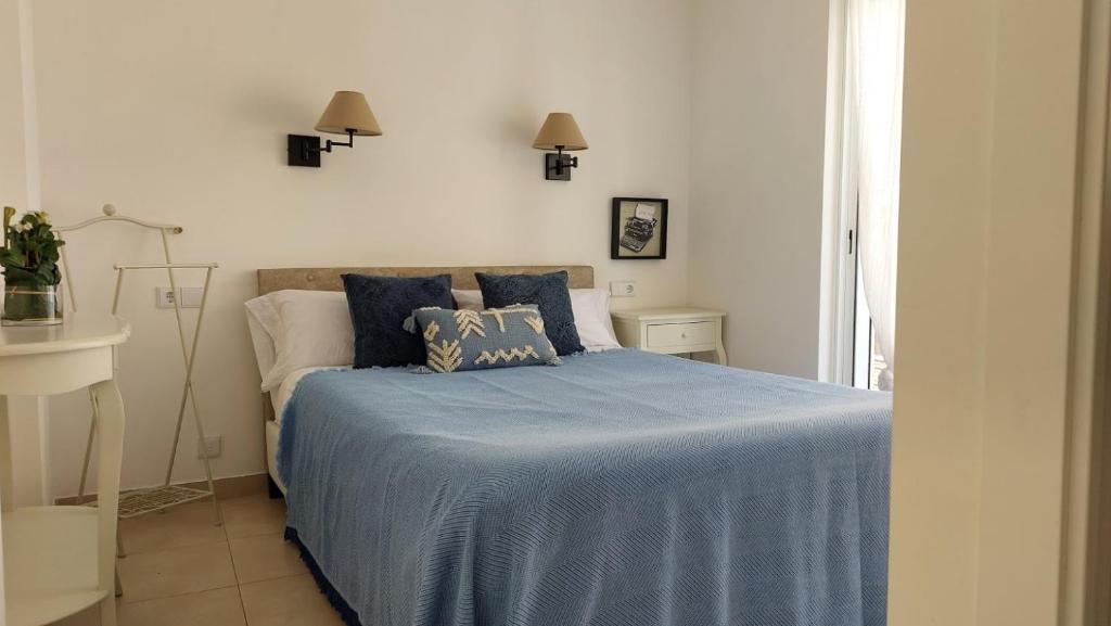 Posteľ alebo postele v izbe v ubytovaní Apartamento para 2/3 personas cerca de la playa