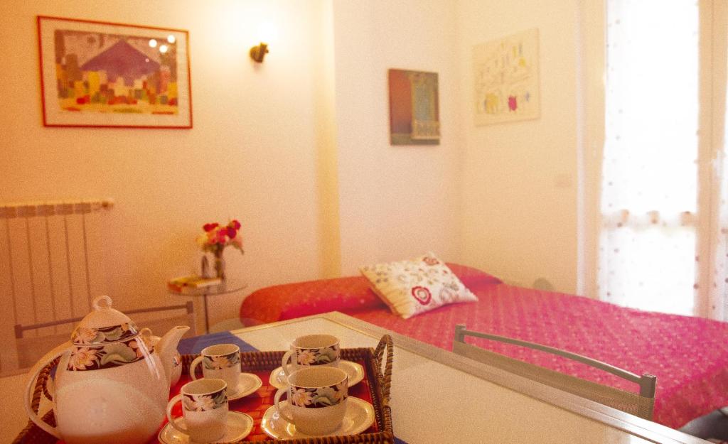 Postel nebo postele na pokoji v ubytování La Casetta B&B
