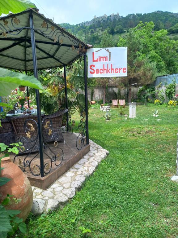 a gazebo with a sign that reads limit slaughter at Limi Sachkhere in Ssatschcheri