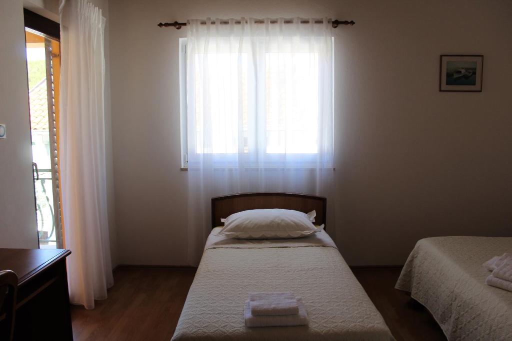 Postel nebo postele na pokoji v ubytování Apartment BenTen
