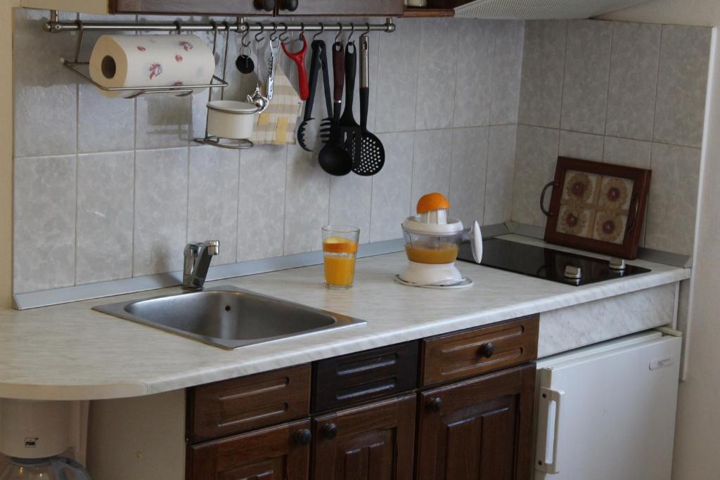 Kuchyň nebo kuchyňský kout v ubytování Apartment BenTen