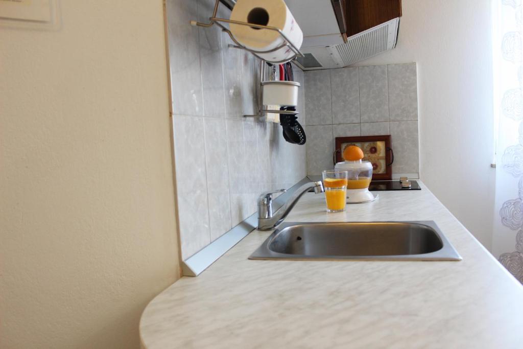 Kuchyň nebo kuchyňský kout v ubytování Apartment BenTen