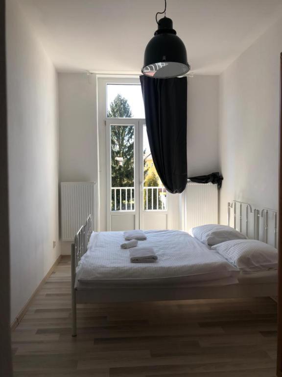 Postel nebo postele na pokoji v ubytování Apartman Kryštof