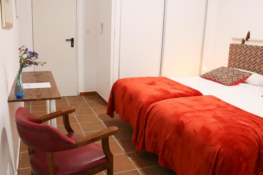 Postel nebo postele na pokoji v ubytování Hacienda la Divertida