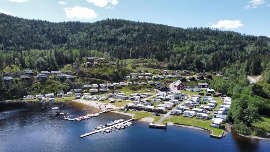 an aerial view of a resort on a lake at Garvikstrondi Camping in Seljord