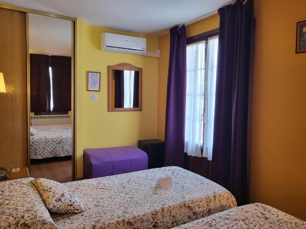 Postel nebo postele na pokoji v ubytování Hotel Virginia R.H.