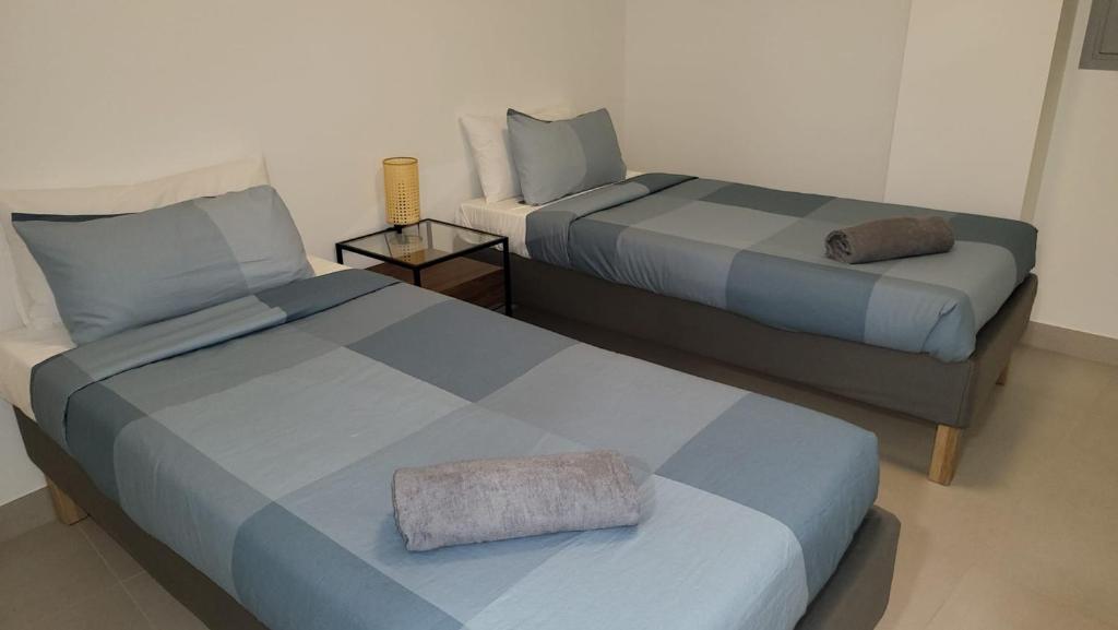 Posteľ alebo postele v izbe v ubytovaní High end large ground floor with luxury private pool and sea views