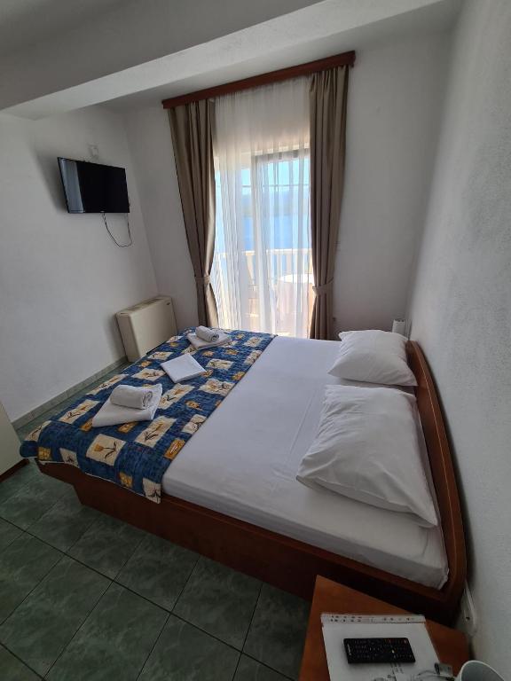 Postel nebo postele na pokoji v ubytování Villa Ancora
