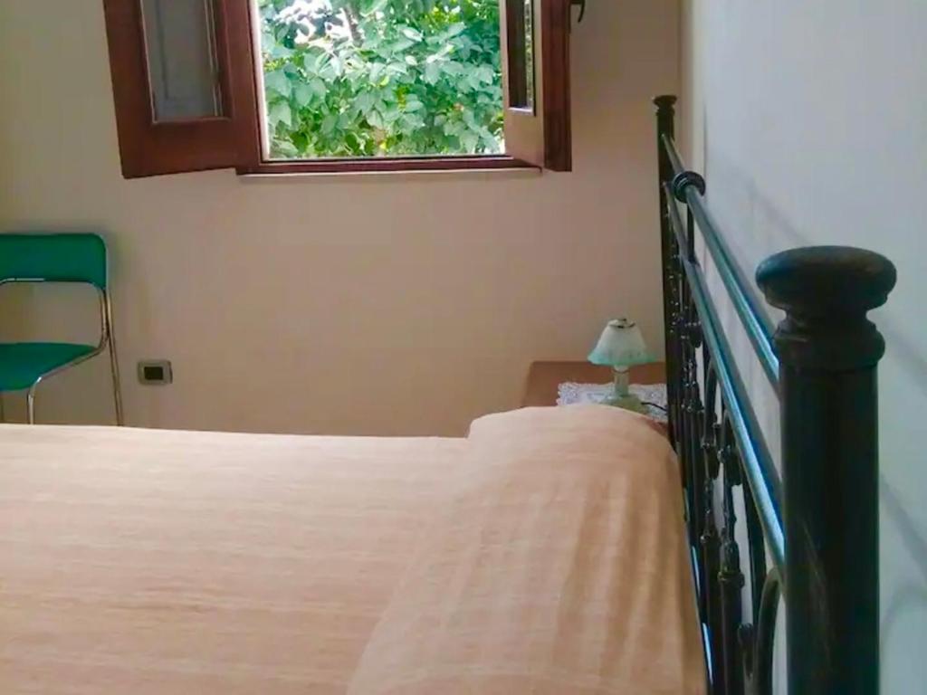 A bed or beds in a room at Stone House