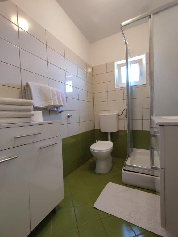 Koupelna v ubytování Apartments Laus