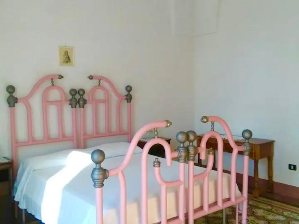 A bed or beds in a room at Stone House