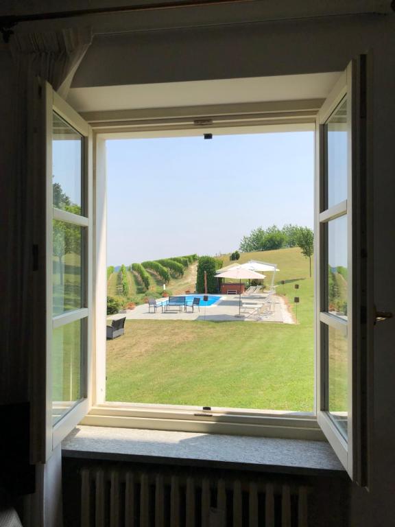 Bazén v ubytovaní Agriturismo La Casa in Collina alebo v jeho blízkosti