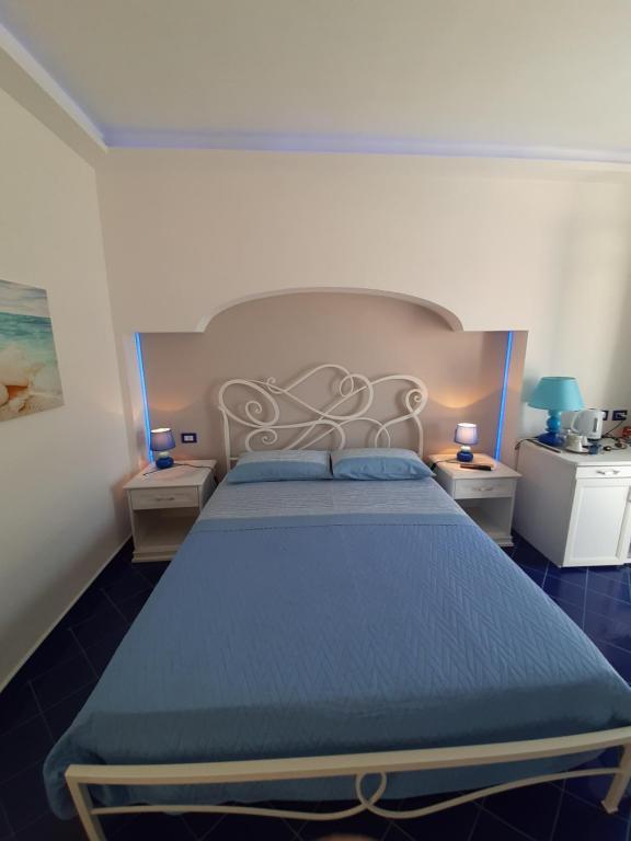 Ένα ή περισσότερα κρεβάτια σε δωμάτιο στο Santa Margherita Suite