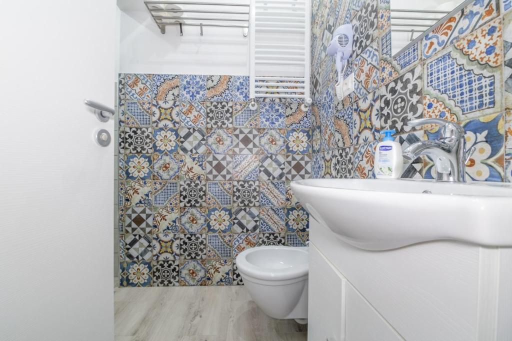 Koupelna v ubytování Residenza Borgo Guazzo