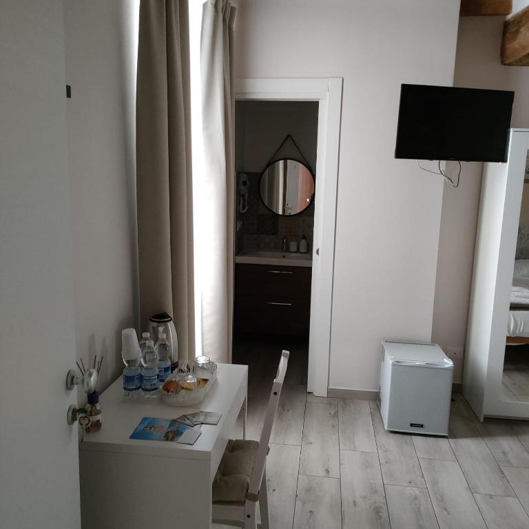 TV a/nebo společenská místnost v ubytování Residenza Borgo Guazzo