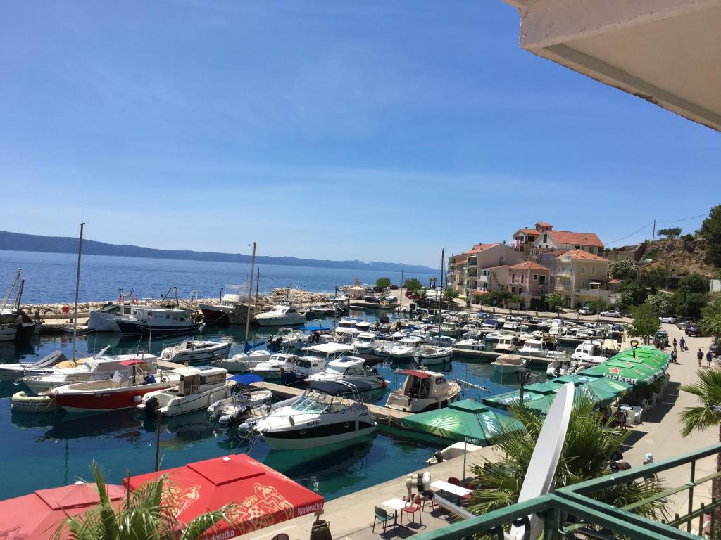 a bunch of boats docked in a harbor at Apartment Nola in Podgora