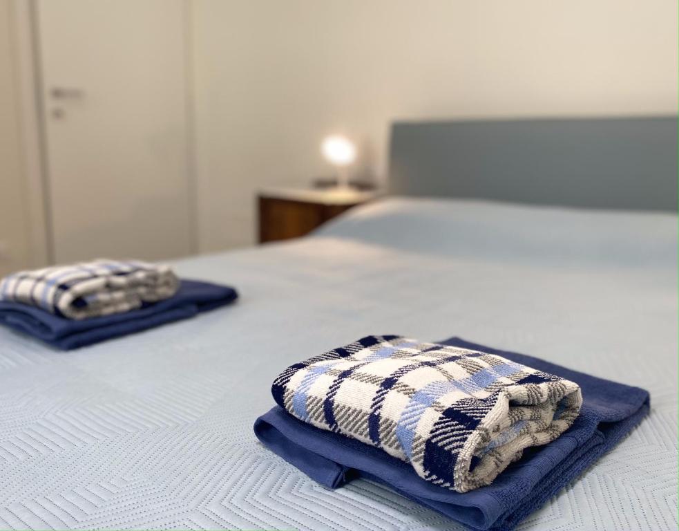 Posteľ alebo postele v izbe v ubytovaní Hostdomus - Trilocale Da Dino