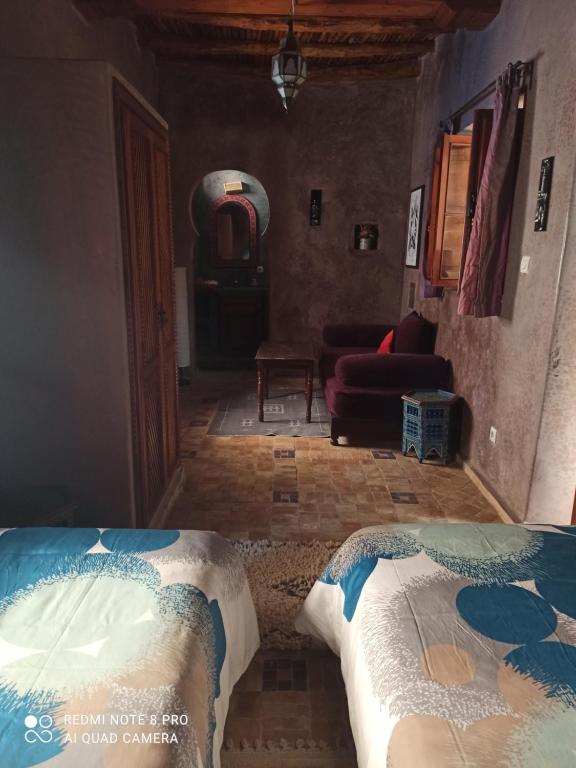 Postel nebo postele na pokoji v ubytování Riad La Rose Des Vents