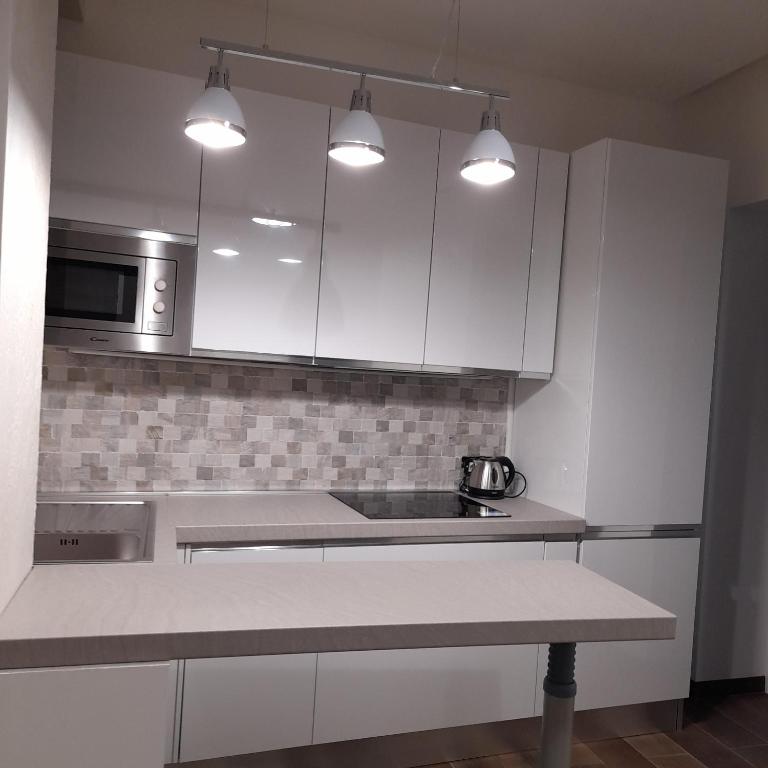 A kitchen or kitchenette at Residenza N&D Luxury
