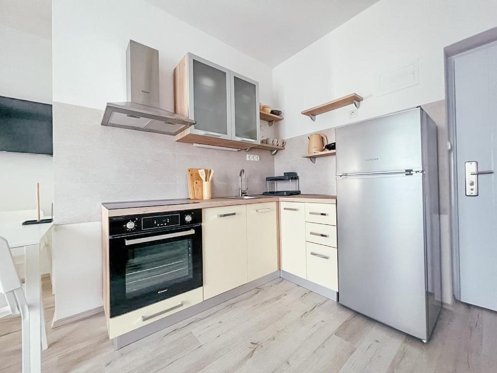 Kuchyňa alebo kuchynka v ubytovaní Apartments Happy