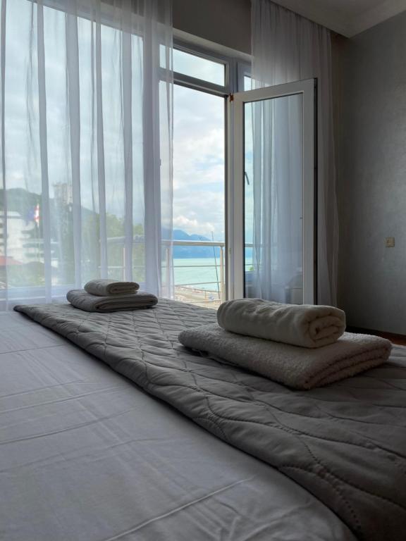 Postel nebo postele na pokoji v ubytování SARPI HOTEL NUMA