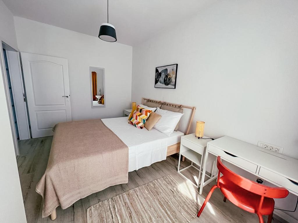 Posteľ alebo postele v izbe v ubytovaní Apartments Happy