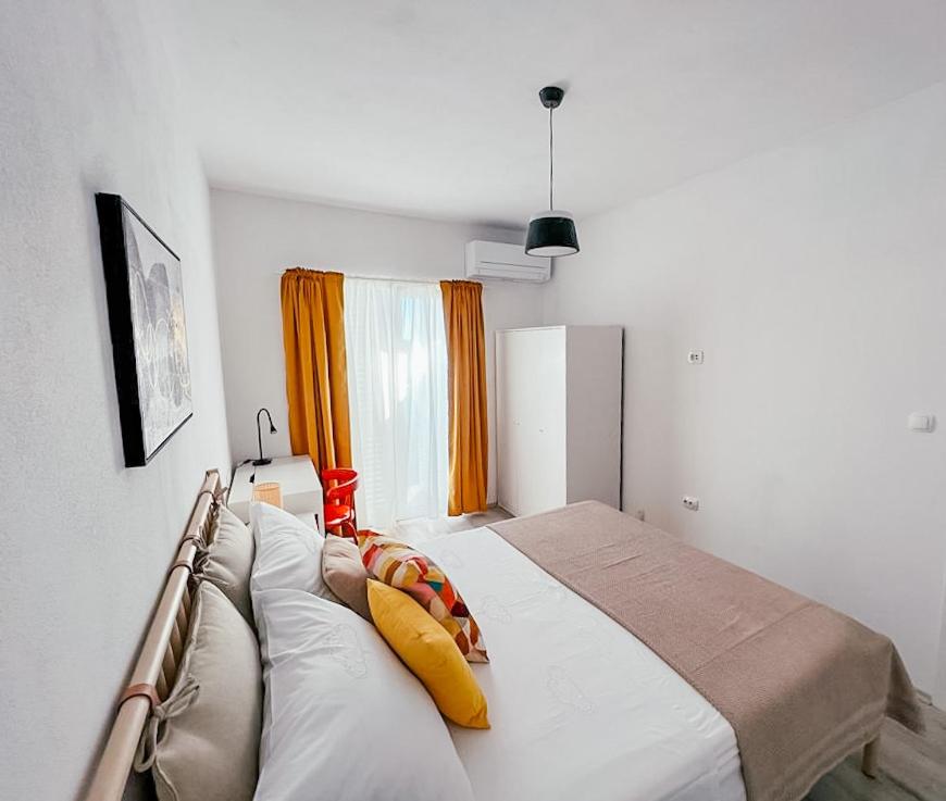Posteľ alebo postele v izbe v ubytovaní Apartments Happy