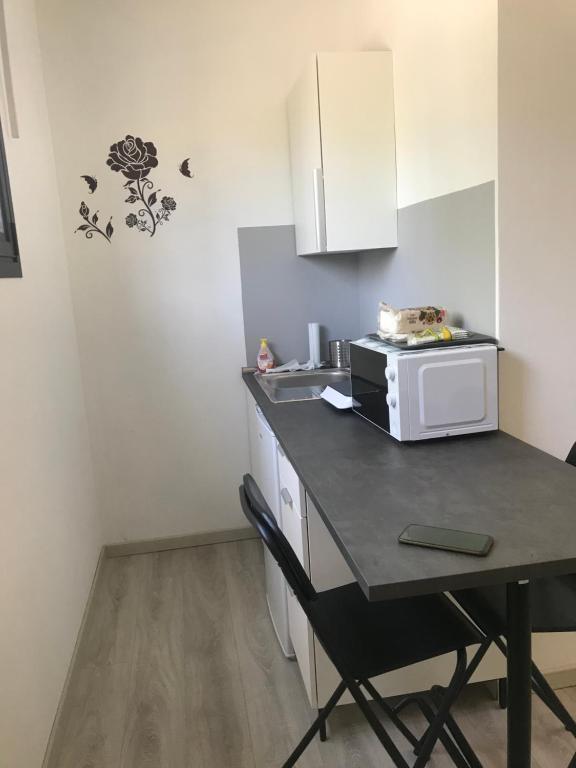 Kuchnia lub aneks kuchenny w obiekcie LA ROSA APP