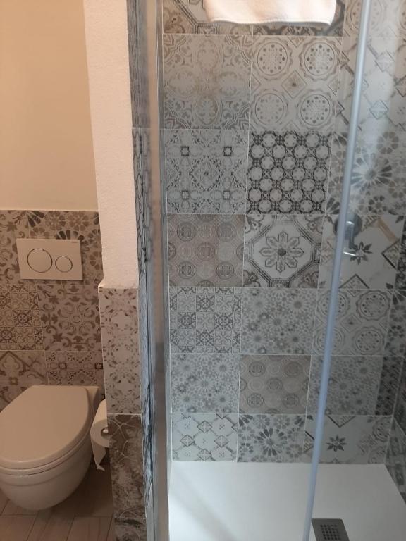 Łazienka w obiekcie LA ROSA APP