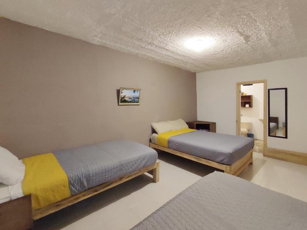 Hostal IKAL - Vierbettzimmer Mit Eigenem Bad