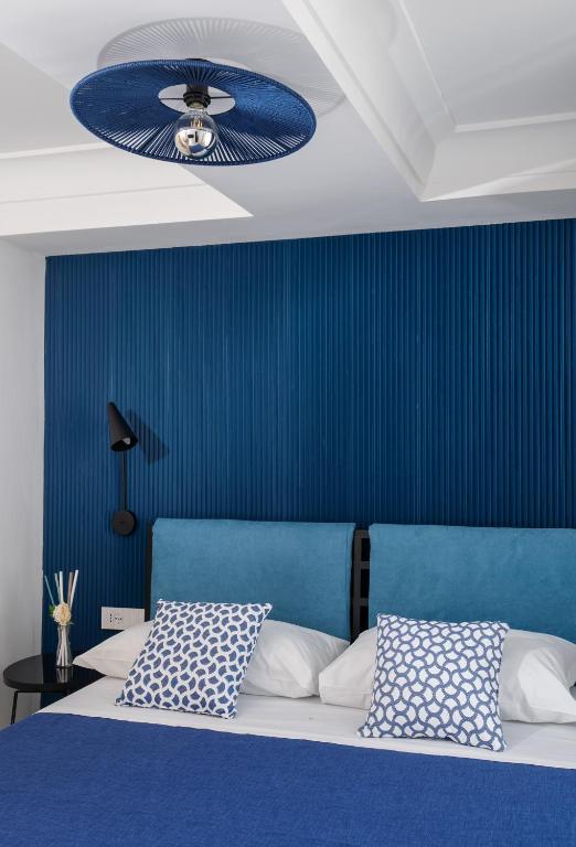 Postel nebo postele na pokoji v ubytování Capri Blue Luxury Villa Le Tre Monelle