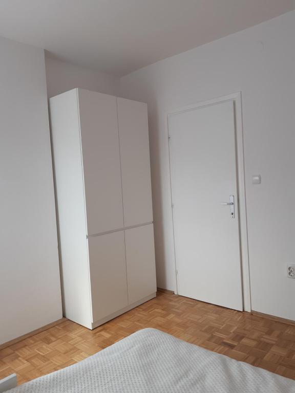 Posteľ alebo postele v izbe v ubytovaní Blaslov Family Apartment
